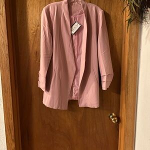 The blazer is a boutique brand. Size M